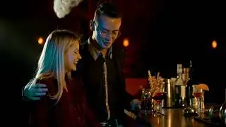 Young couple hugging in the bar