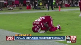 Penalty on player's prayer ignites debate