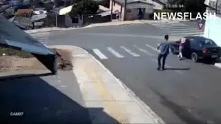 Brave Man Jumps Into Runaway Car To Stop Crash