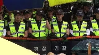 S. Korea police storm compound in search for ferry owner