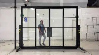 Interior Decor Idea | Black Framed Glass Wall with Sliding Doors | Industrial Modern Design