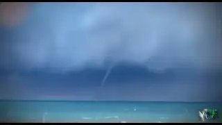 White Orb Like Chariot Emerges From The Sea During A Storm