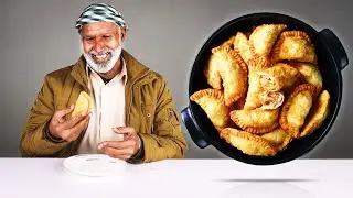 Представители племен пробуют австралийский мясной пирог