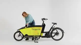 12. Hoe rol je het regendekje open  van de Cargoroo? #letscargoroo
