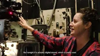 Behind the scenes of the Music Box film projection booth for TRAIN DREAMS