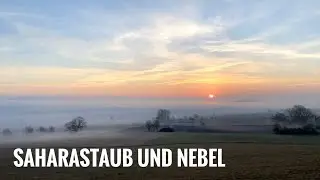 Blutmond und Blutsonne &uuml;ber Nebelmeer im Harzvorland