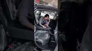 Cute Chinese girl remove her high heel and show her nylon feet in car