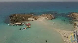 Nissi Beach - Ayia Napa - The Island of Cyprus - 4K Aerial Video - Sandy Beach - Crystal Clear Water