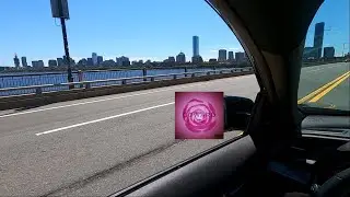 POV Driving Boston Skyline