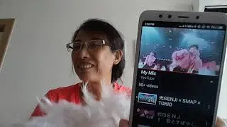 Playing Japan 1987 Hikaru Genji with a White Feather Fan