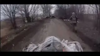 Russian soldiers on an ATV