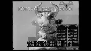 Jewish People dacing around a Statue of Moloch in the World Fair of 1933