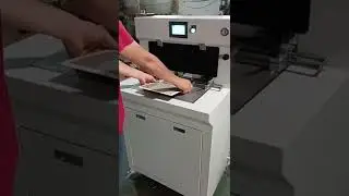 Corner rounding machine for round hardcover book