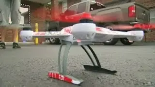 Drone drops off a package of drugs in prison yard