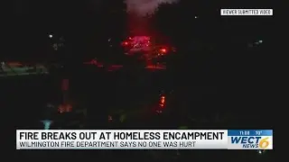Neighbors hear explosive sounds as fire breaks out at homeless encampment