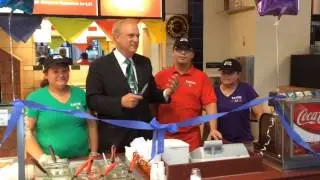 Worcester Mayor Joseph Petty cuts the ribbon at Taco Mexico