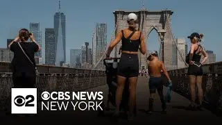 How do New Yorkers deal with extreme summer heat?