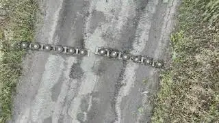 Ukraine - XX.08.2024. Operator Clearing A Russian Anti-Tank Mine Barrier Using A Copter.