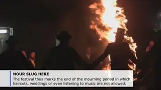 Thousands of Jews celebrate Lag BaOmer festival with music, bonfires