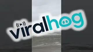 Kitesurfer Catches Huge Air During Storm || ViralHog