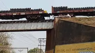 WAG 7 hauled flat bed wagon rake entering Bondamunda from Hatia Line