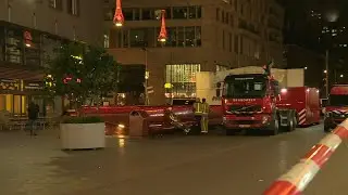 Emergency services at the scene of Hague stabbing | AFP