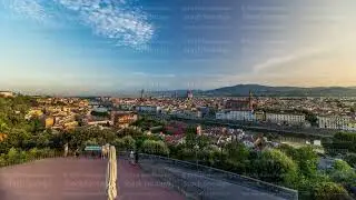 Top view of Florence city timelapse at sunrise with arno river bridges and historical buildings