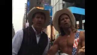 The Naked Cowboy and Carew Papritz in Times Square, New York, NY