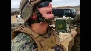 View a US soldier mimics a turtle