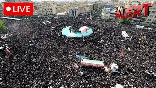 Mourners hold funeral procession outside of Tehran University