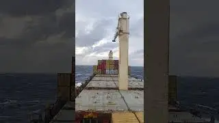 Watch This Unbelievable Moment of a Sea Pitching Container Ship!