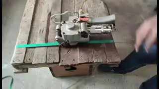Pneumatics Strapping Machine for PET / PP Strap by Merit Straps & Packaging Industries.