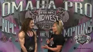 Brooke Walker interviews Emily Schubert at the checking for the 2023 IFBB Omaha Pro.
