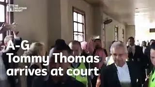 A-G Tommy Thomas arrives at court