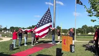Honoring a Hero: Raising a 60-ft Flagpole for USMC Veteran, POW and EHS Alumni
