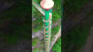China Travel: Dare to Climb? The Sky Tube Ladder Adventure in Henan!