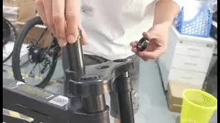 V20 ebike's front fork is loose, How to tight it?