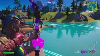 Hit an opponent with a fully drawn Primal Flame Bow Fortnite
