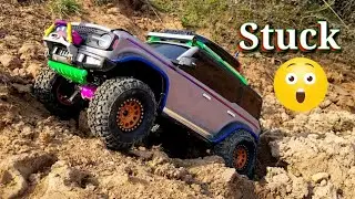 Rc Car Land Rover Bronco driving on a field road. remote control car Rc Crawler 4&times;4 rc off roading