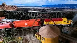 Rapido Bilevel Cars and Walthers and Intermountain Hopper Cars