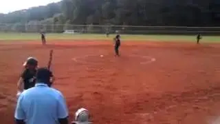 Natalie Giroux- hits a one bounce over the fence double
