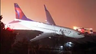 Delta plane skids off runway at Atlanta airport