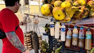 Drinking palm juice and eating palm fruits is really delicious. ##059
