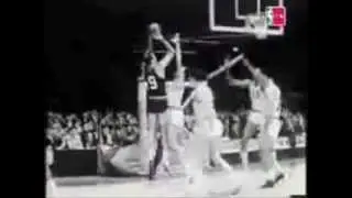 Bob Pettit shoots over Wilt Chamberlain