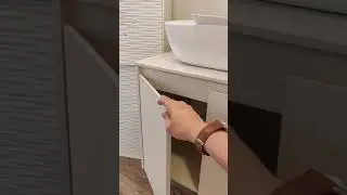 Varde wood color basin cabinet with sold surface top
