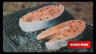 Describe the process of smoking fish for preservation and flavor enhancement.