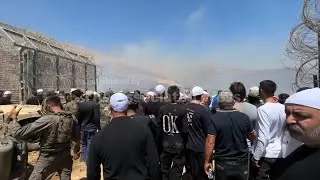 Dozens of Druze community members seen crossing into Syria at Golan Heights border