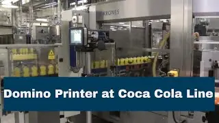 Domino D Series Laser Printer on high speed Coca Cola Line