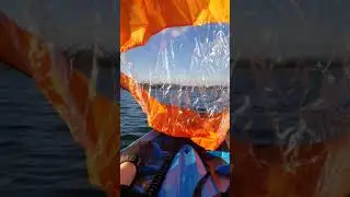 Kayak sailing on sit on top kayak