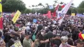 Thousands protest in Taipei over US pork imports
